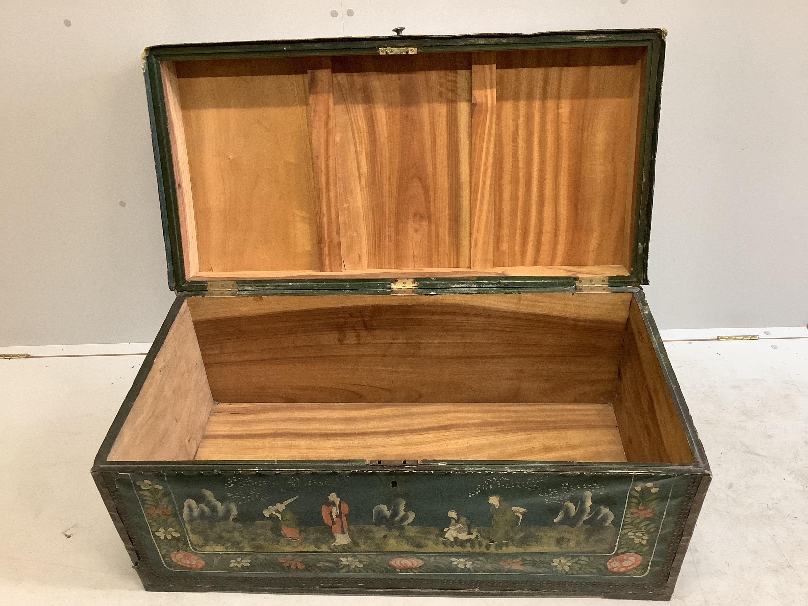 A Japanese rectangular brass and leather mounted camphorwood trunk painted with figures in landscapes, width 103cm, depth 52cm, height 46cm